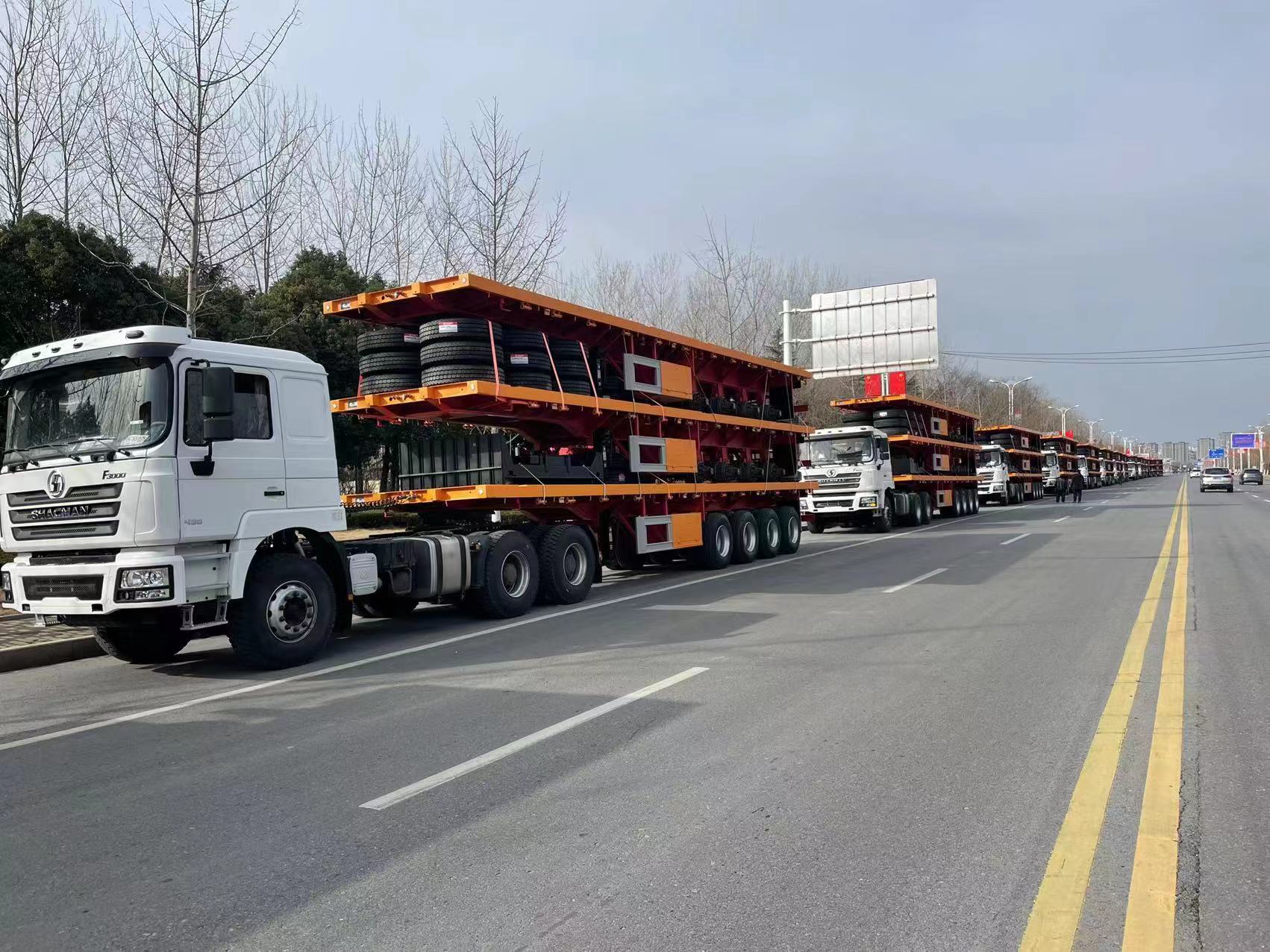 4 Axles Flatbed Semi Trailers ແມ່ນກຽມພ້ອມສໍາລັບການຈັດສົ່ງໄປປະເທດອາຟຣິກາ